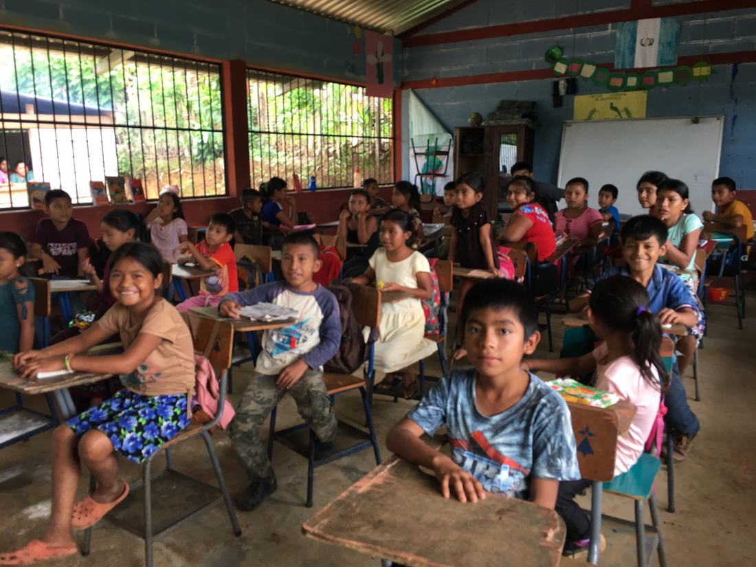Students filling the one-room classroom at Barrio El Jordán school